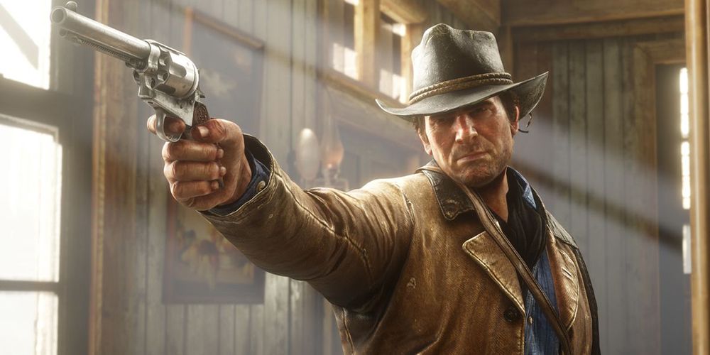 Arthur Morgan with a revolver in Red Dead Redemption 2