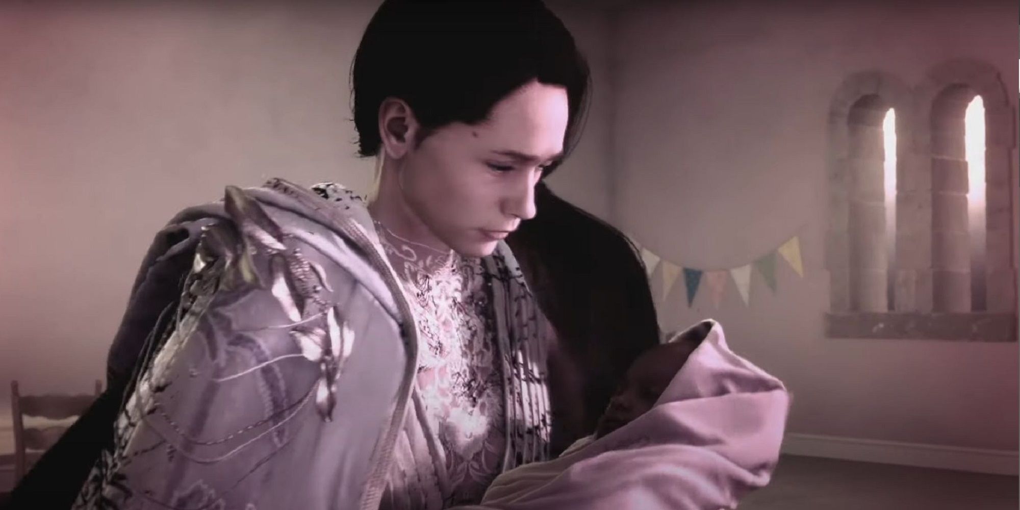 Tanta Cinta Holding Baby Frey Wrapped In A Blanket