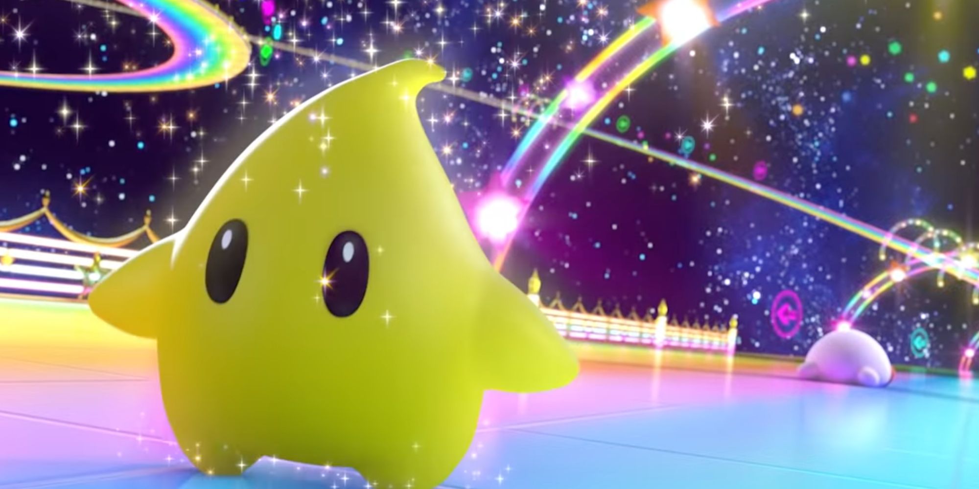 Luma, from Super Mario Galaxy and Super Smash Brothers Ultimate, on Rainbow Road with Kirby in the Background