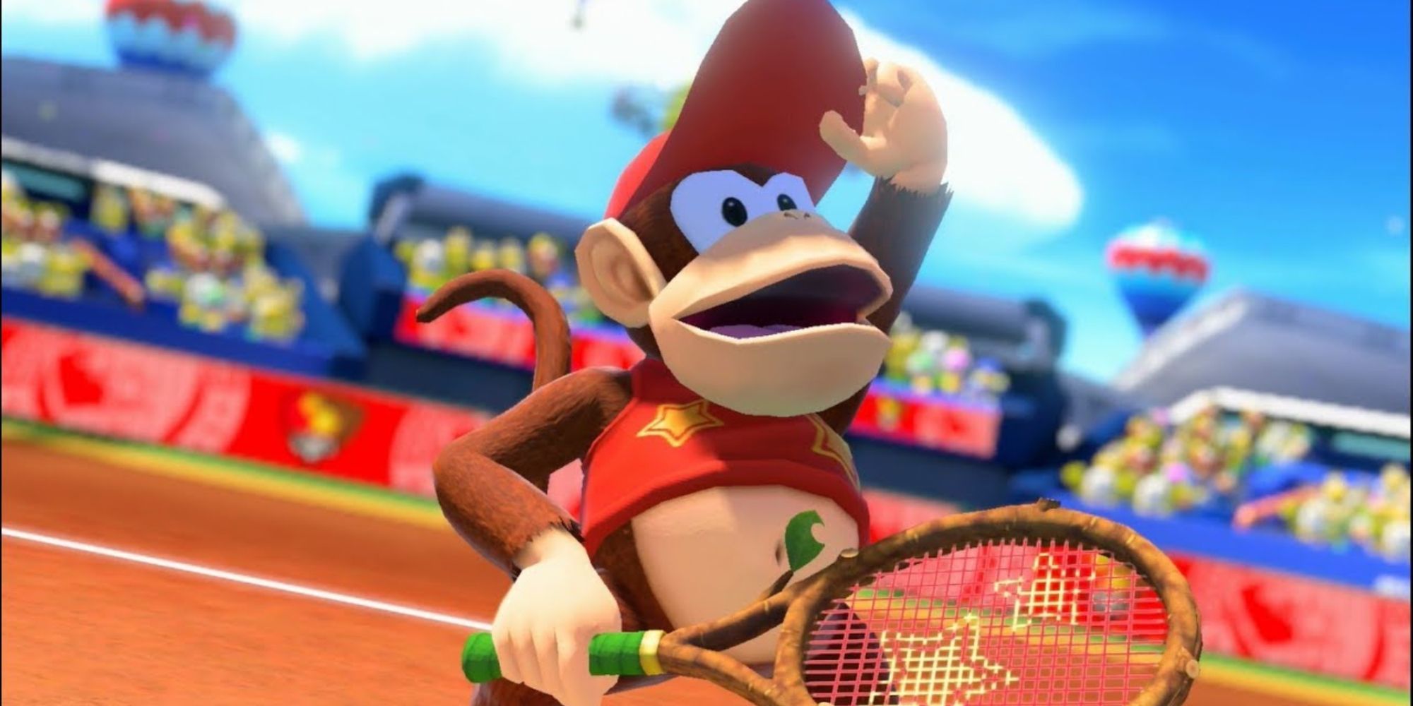 Diddy Kong Holding A Tennis Racket While Looking At The Camera