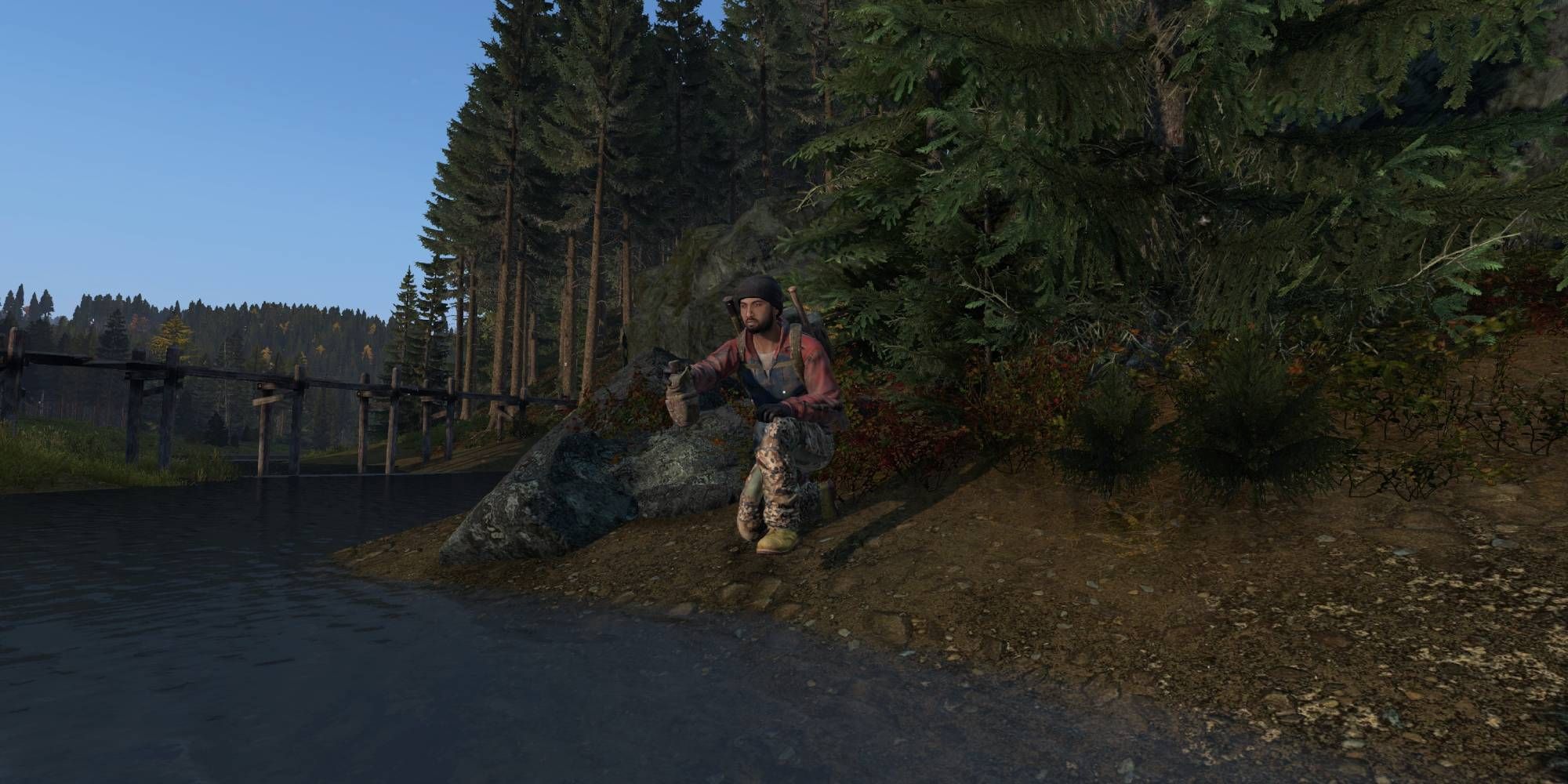 DayZ: A Player Filling A Bottle From A Stream