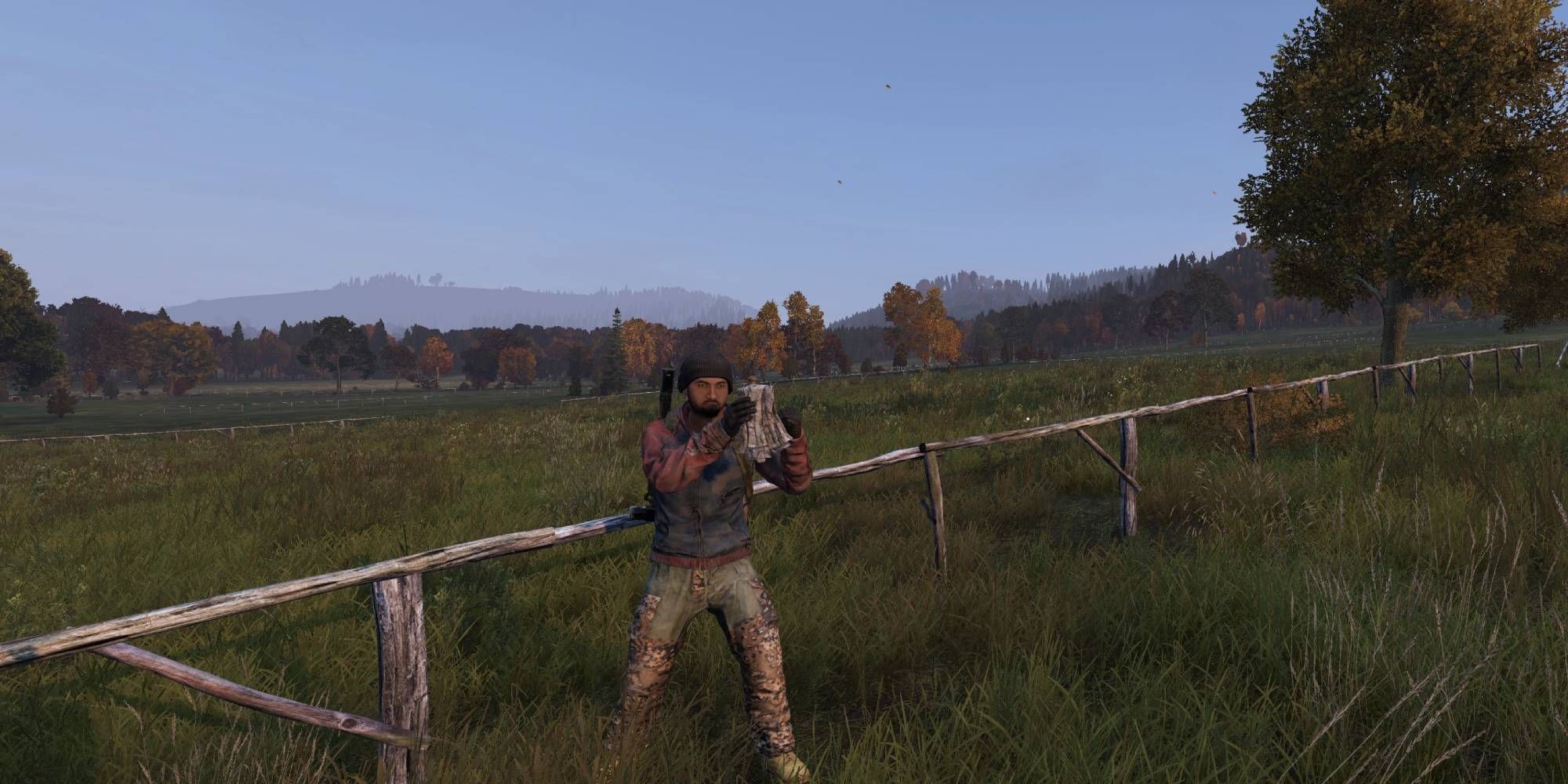 DayZ: The player holding dirty rags that need disinfecting