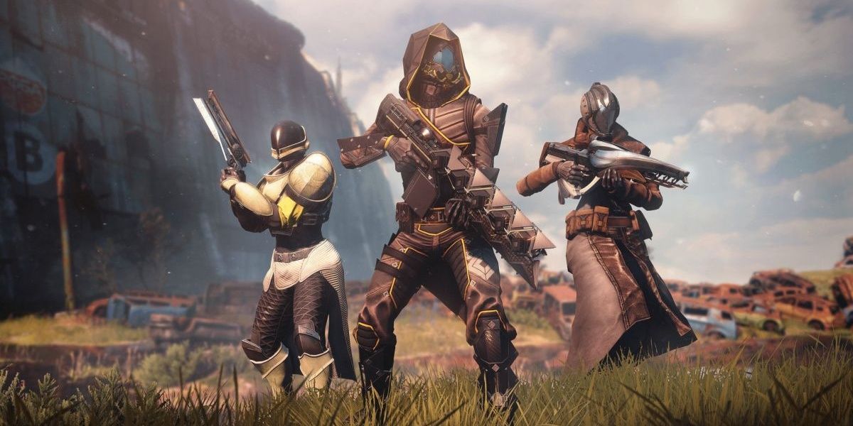 A Titan, Hunter, and Warlock standing together in Destiny 2.