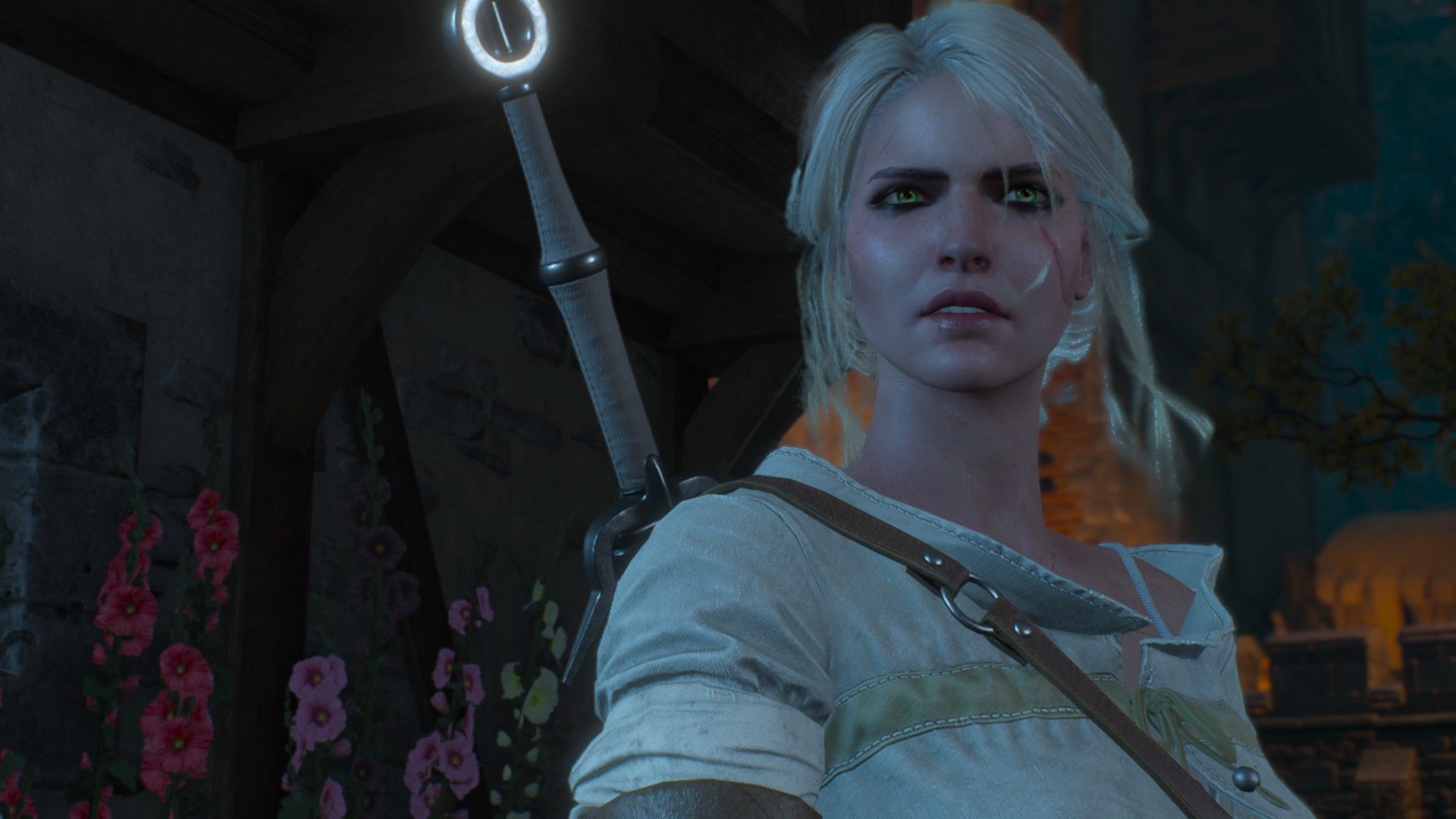 A low-angle, close-up shot of Ciri looking worried at something off-screen in The Witcher 3.