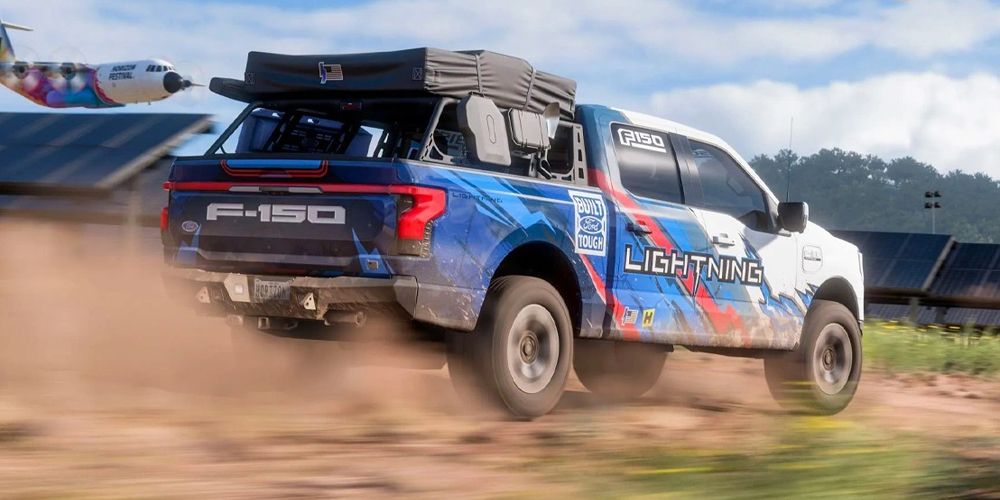 Ford F-150 Lightning Platinum driving across field in forza horizon 5 rally adventure