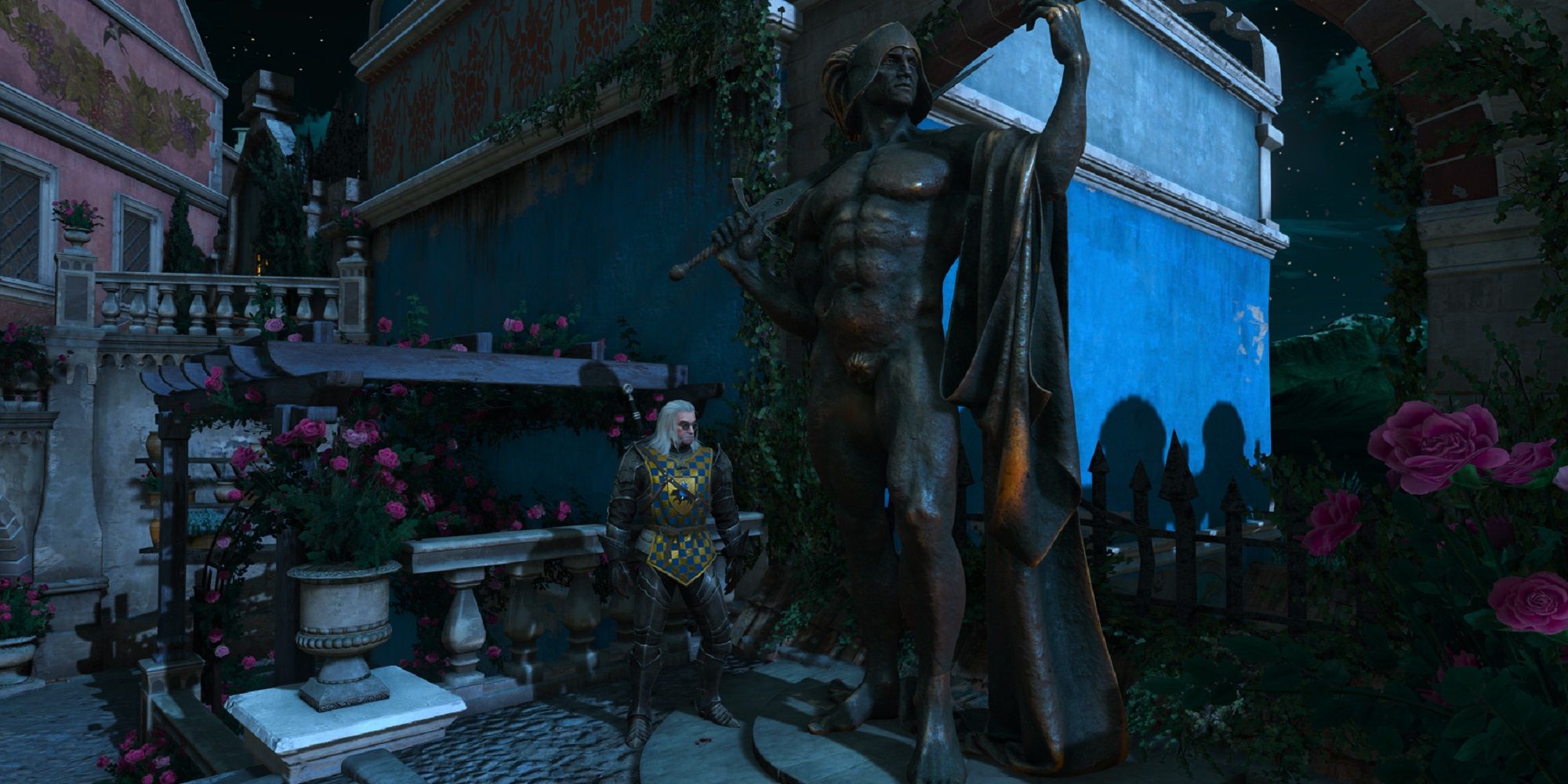Geralt next to a statue in the Witcher 3