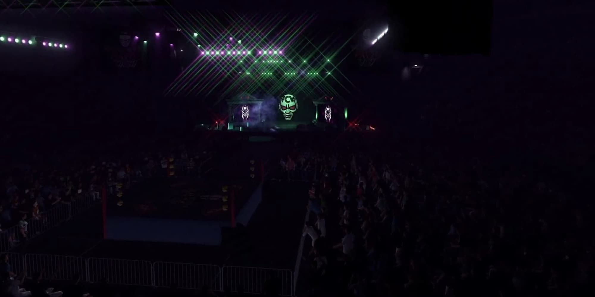 The Halloween Havoc arena in WWE 2K23 shows Rey Mysterio's face on the side screens and is packed with a crowd.