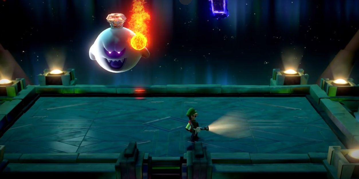 King Boo firing fireballs at Luigi-1