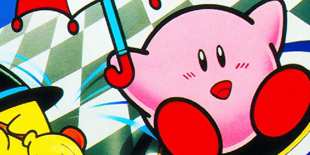 Kirbys Dream Course Cover Zoomed in on kirby with umbrella and broom witch