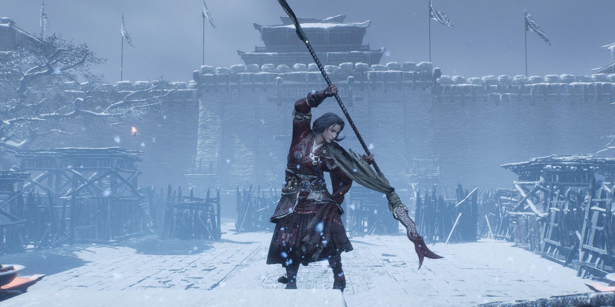 Wo Long: Fallen Dynasty - our character poses in the icy landscape holding their spear out