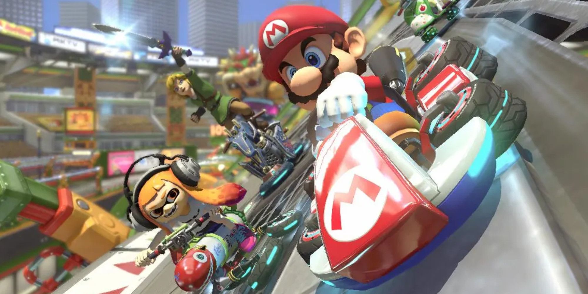 Mario, an Inkling, and Link racing in Mario Kart 8