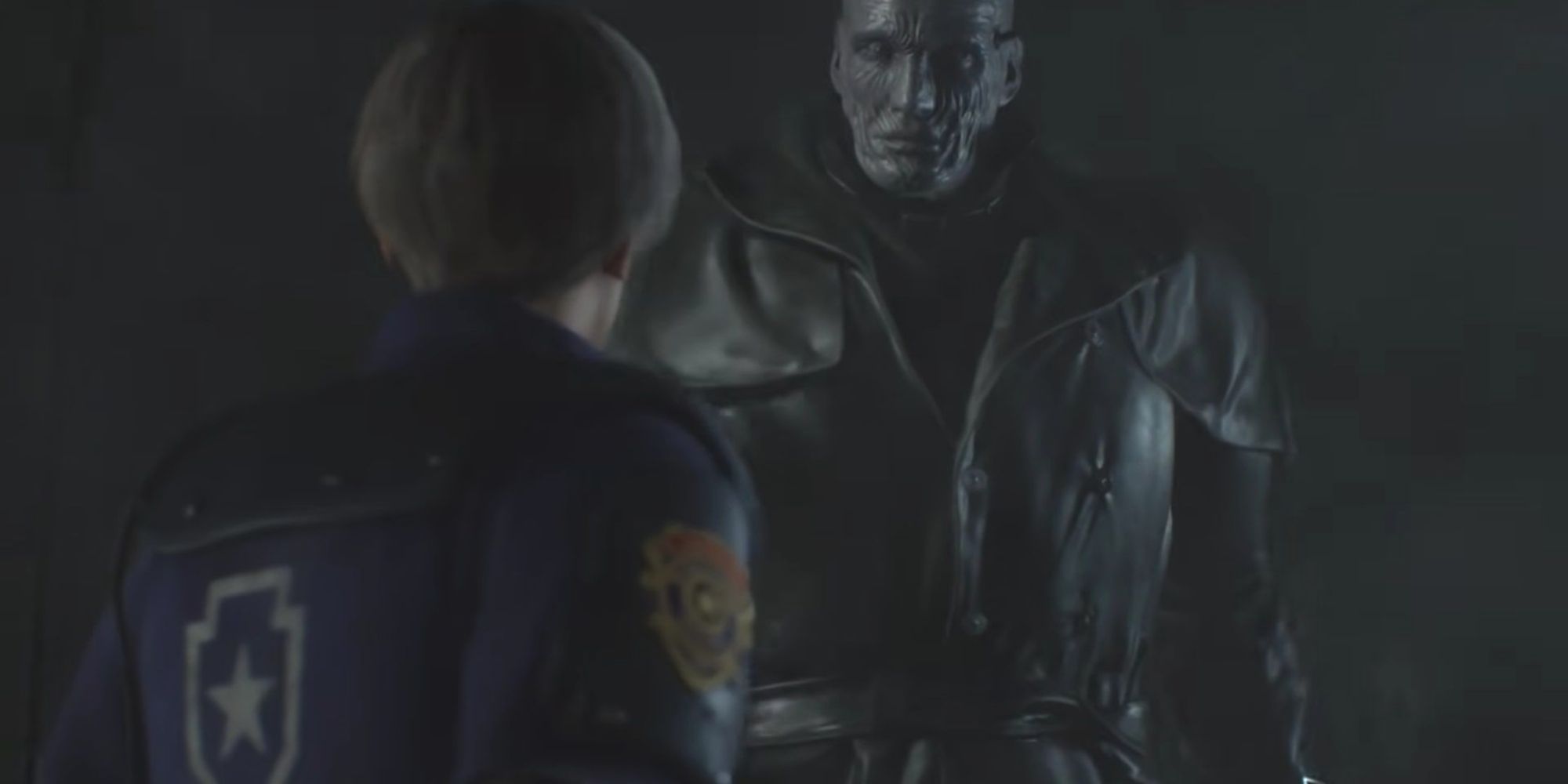 Leon and Mr. X staring at each other in the garage from Resident Evil 2 Remake