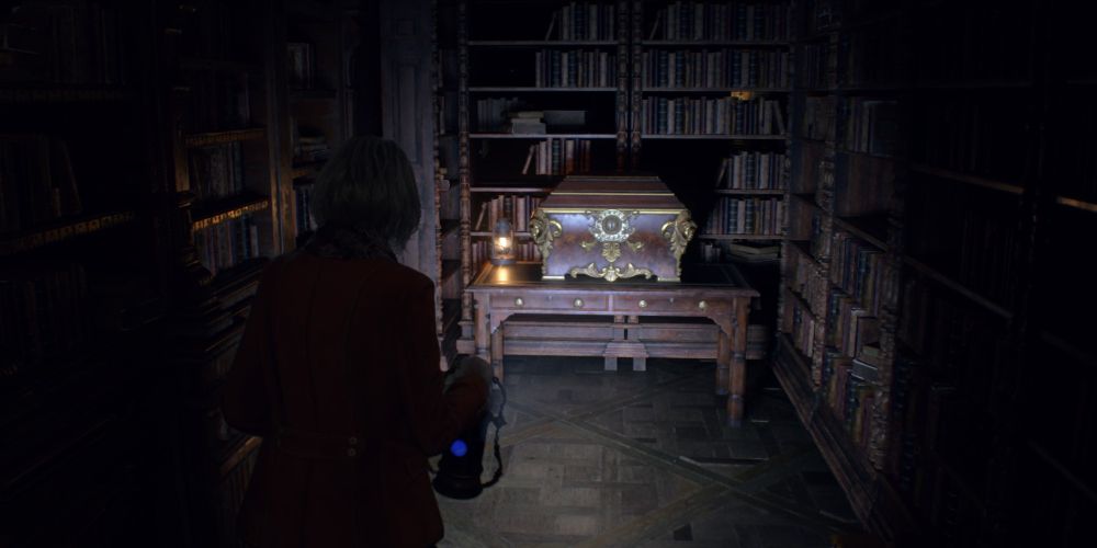 ashley graham finds a treasure chest in the castle salazar library in resident evil 4 remake