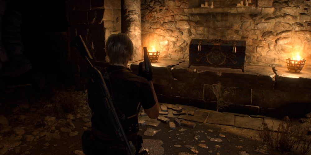 leon kennedy approaches the chest containing the staff of royalty in the cliffside ruins in resident evil 4 remake