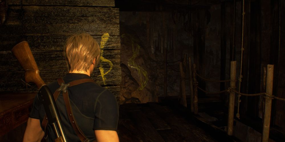 Leon Kennedy finds part of the solution to the blasphemer's head puzzle that can only be seen from the right perspective.
