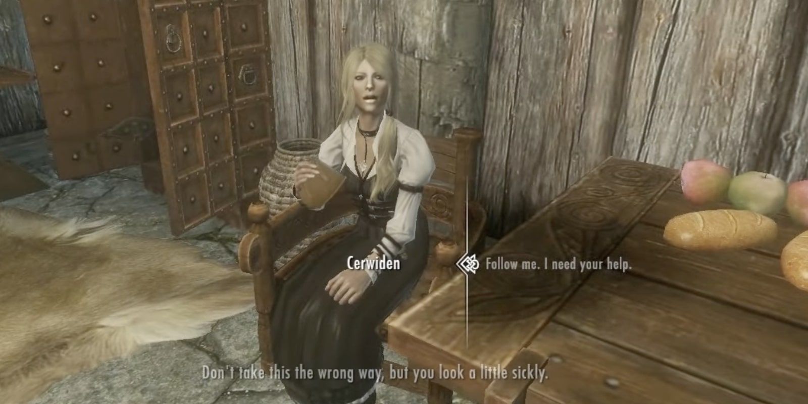 Cerwiden sits in a chair as she is asked for help