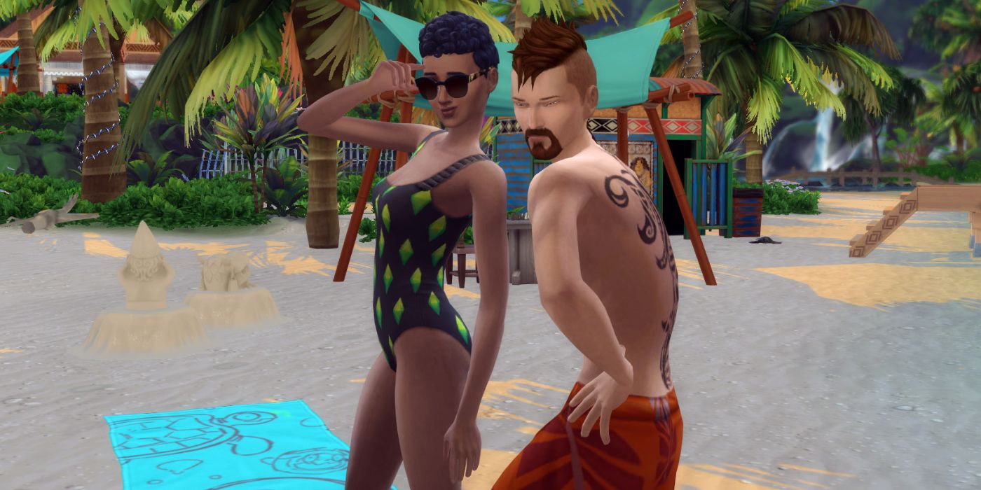 Two Sims posing in swimsuits on the beach