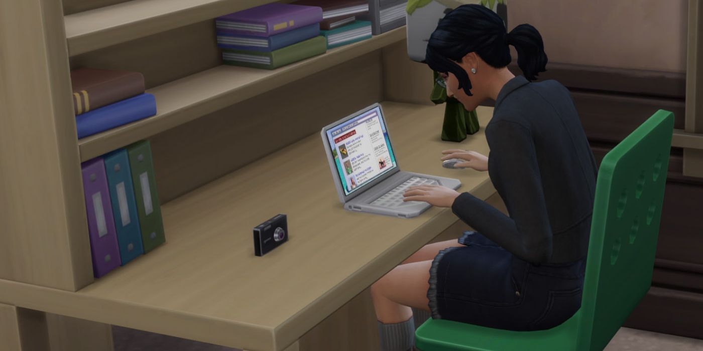 Sims 4 uni cassandra using her laptop