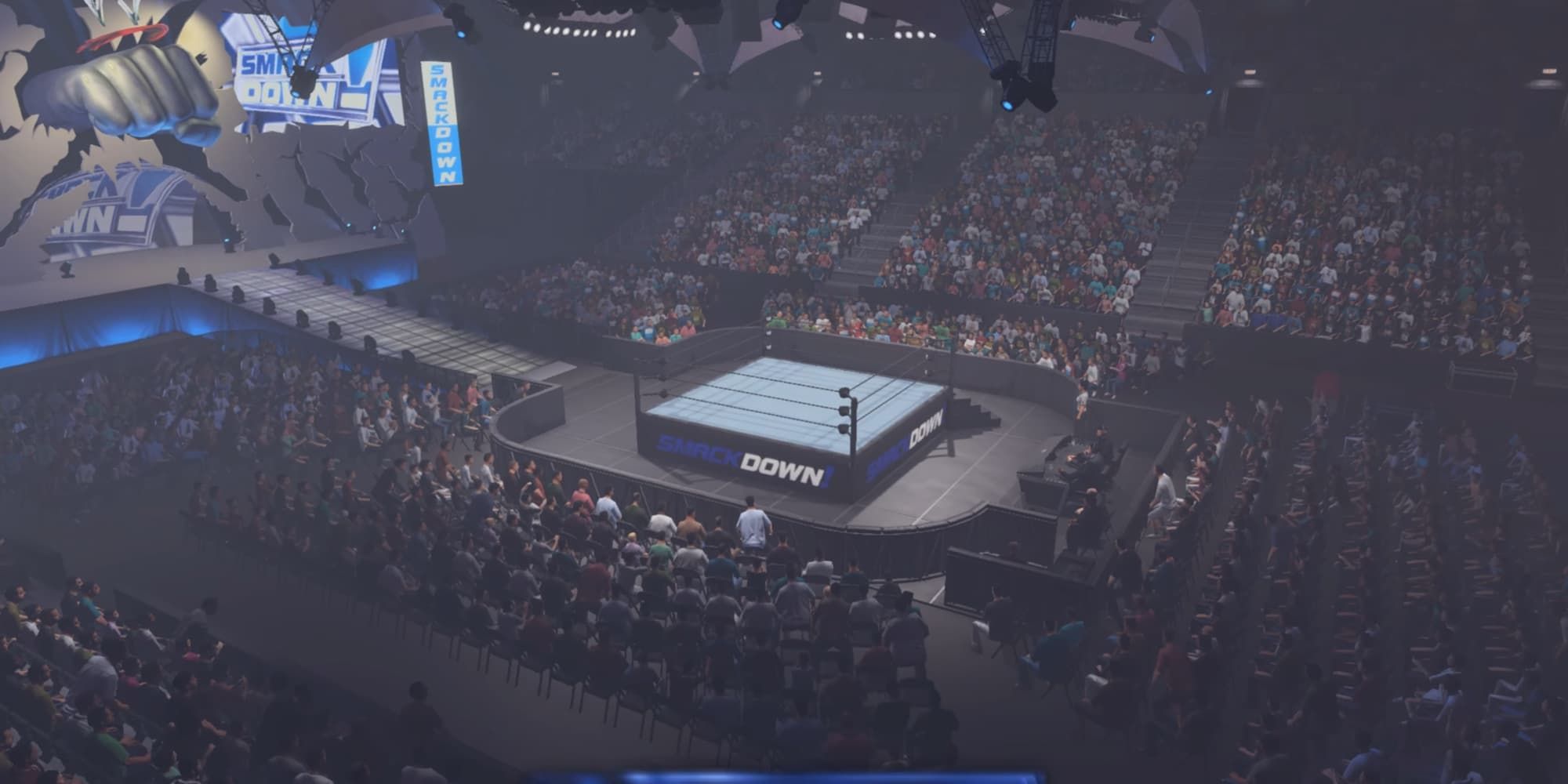 The SmackDown 2002 in WWE 2K23 is filled with audience members and has the iconic fist above the entrance area.