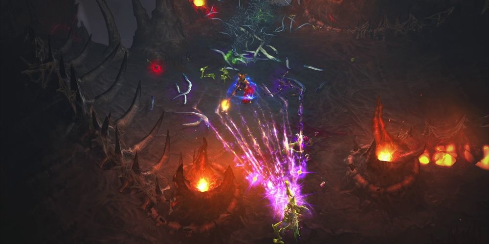 The player in Diablo 3 shooting purple magic at animal-like glowing enemies