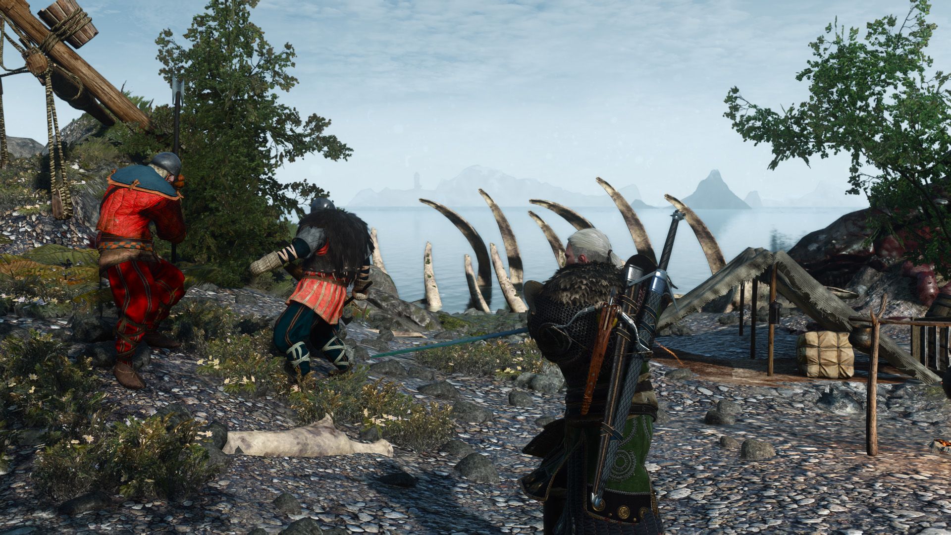 Geralt approaches a pair of enemy fighters by the coast, with the bones of a beached whale in the background.