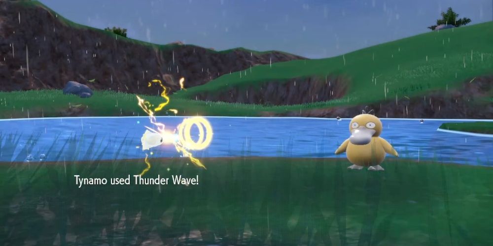 Tynamo using Thunder Wave on Psyduck by shooting yellow rings powered by electricity crackles in Pokemon