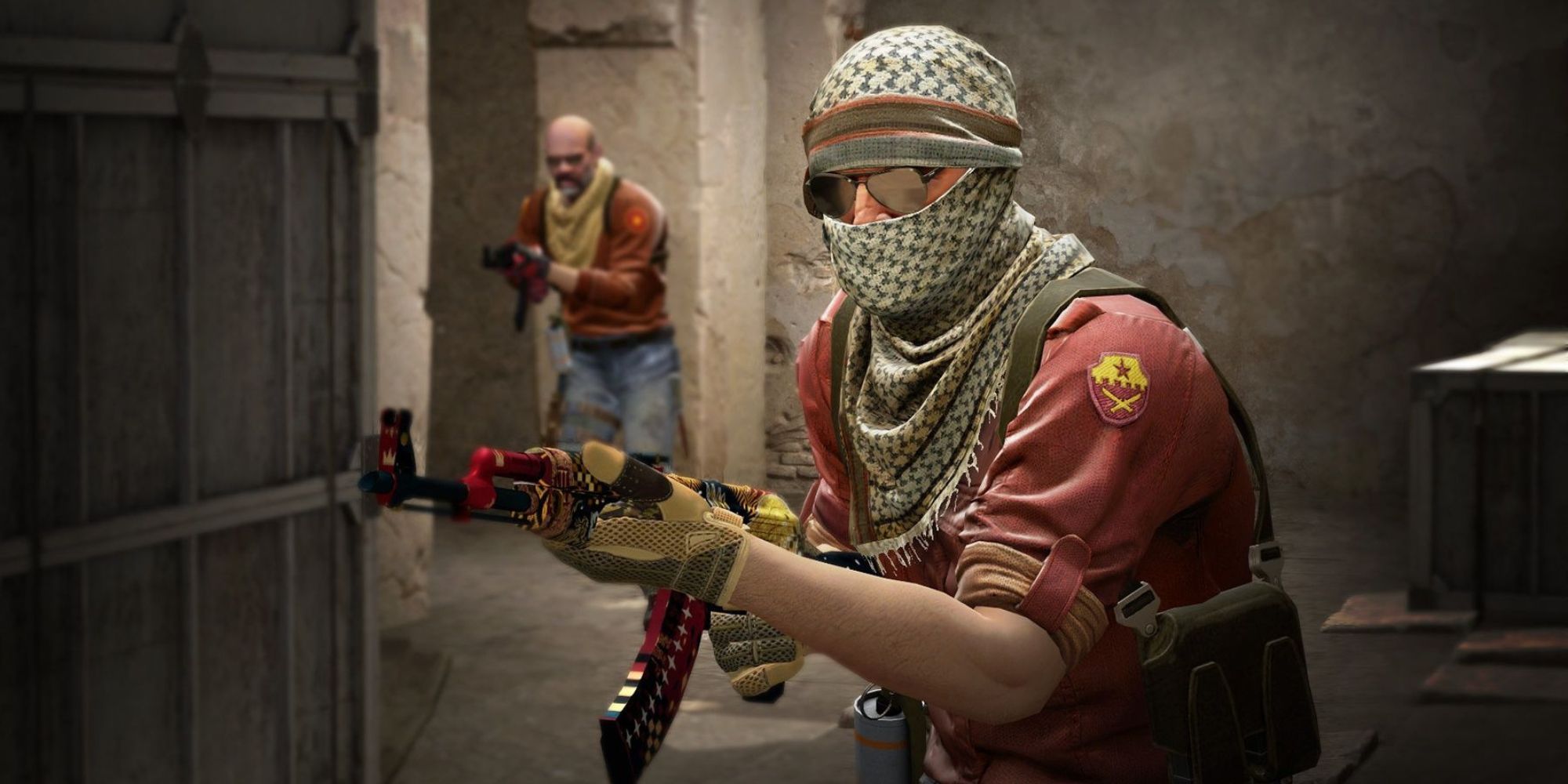 Two terrorist players in Counter Strike: Global Offensive.