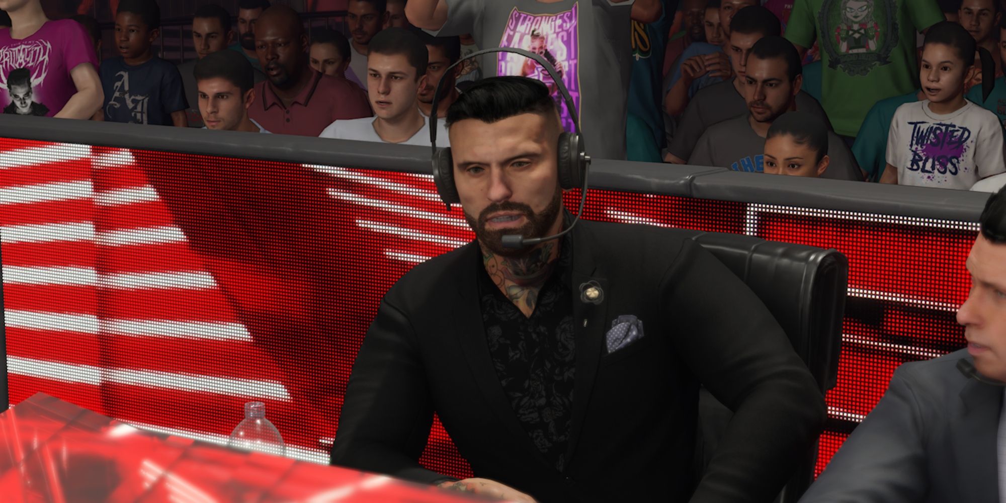 WWE 2K23 Screenshot Of Corey Graves At Commentary Table