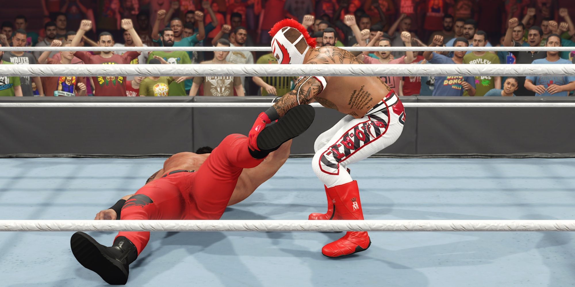 WWE 2K23 Screenshot Of Rey Mysterio Dragging Braun Strowman