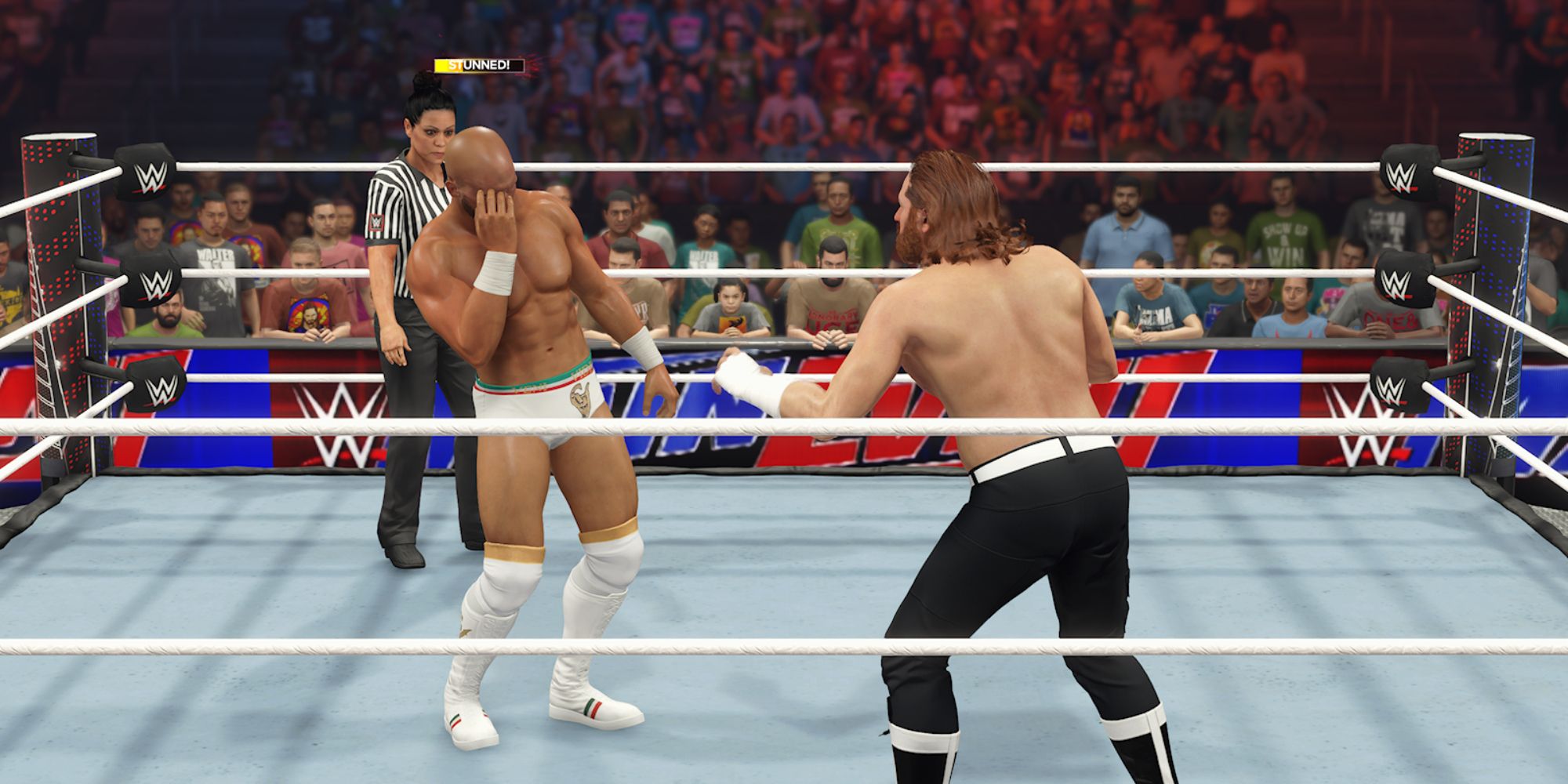 WWE 2K23 Screenshot Of Sami Zayn Looking At Stunned Giovanni Vinci