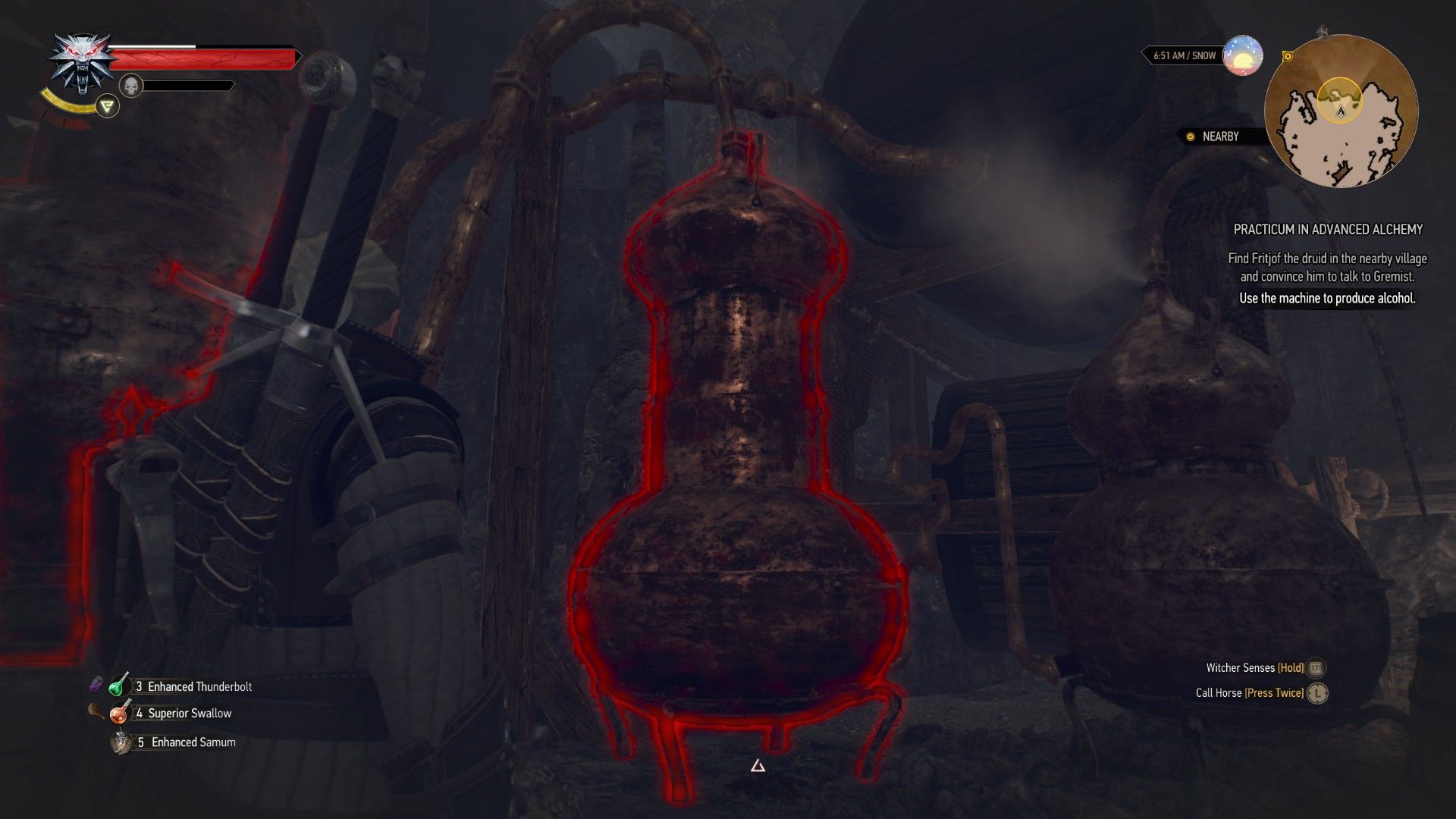 A screenshot of Geralt looking at a large machine used to produce alcohol in a dark cave.