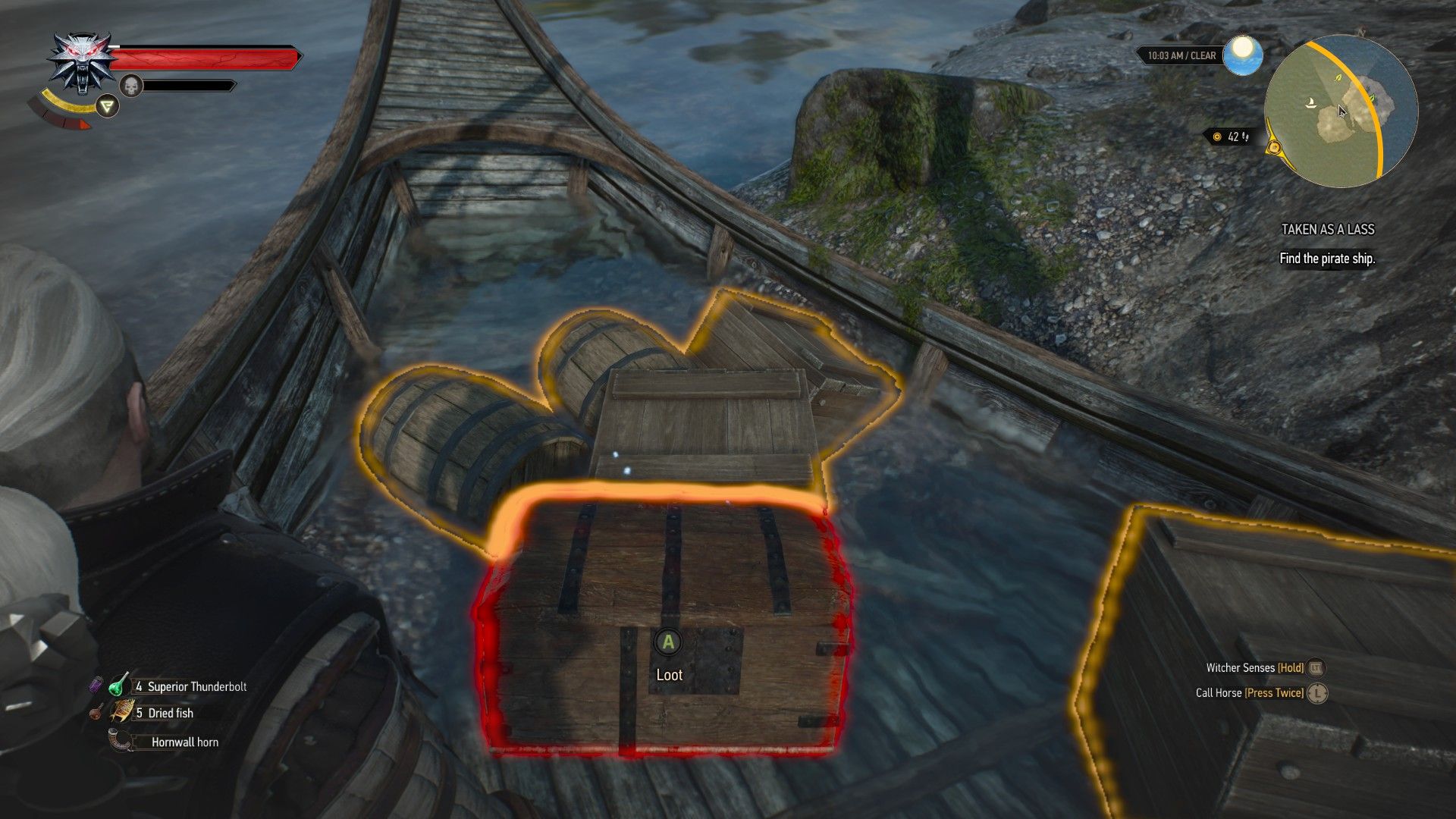 A screenshot of Geralt looking at a treasure chest on the half-sunk deck of a ship in The Witcher 3.