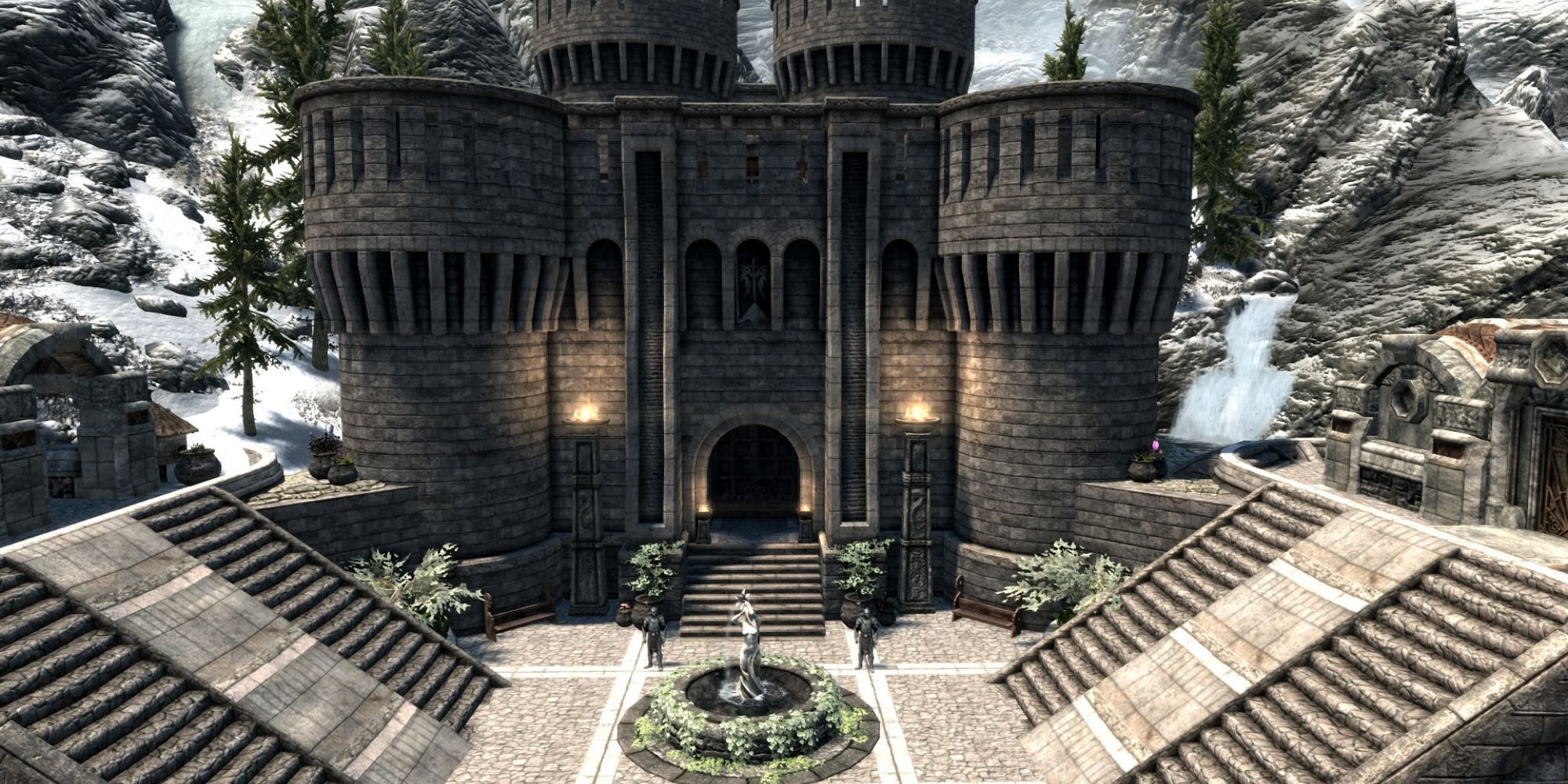 two guards stand in the courtyard of Skystone Castle with stairs leading out to the elevated barracks, main entrance, and stables