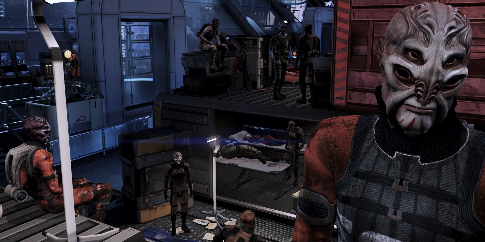 Multiple characters sitting and standing within the Batarian Camp in Mass Effect