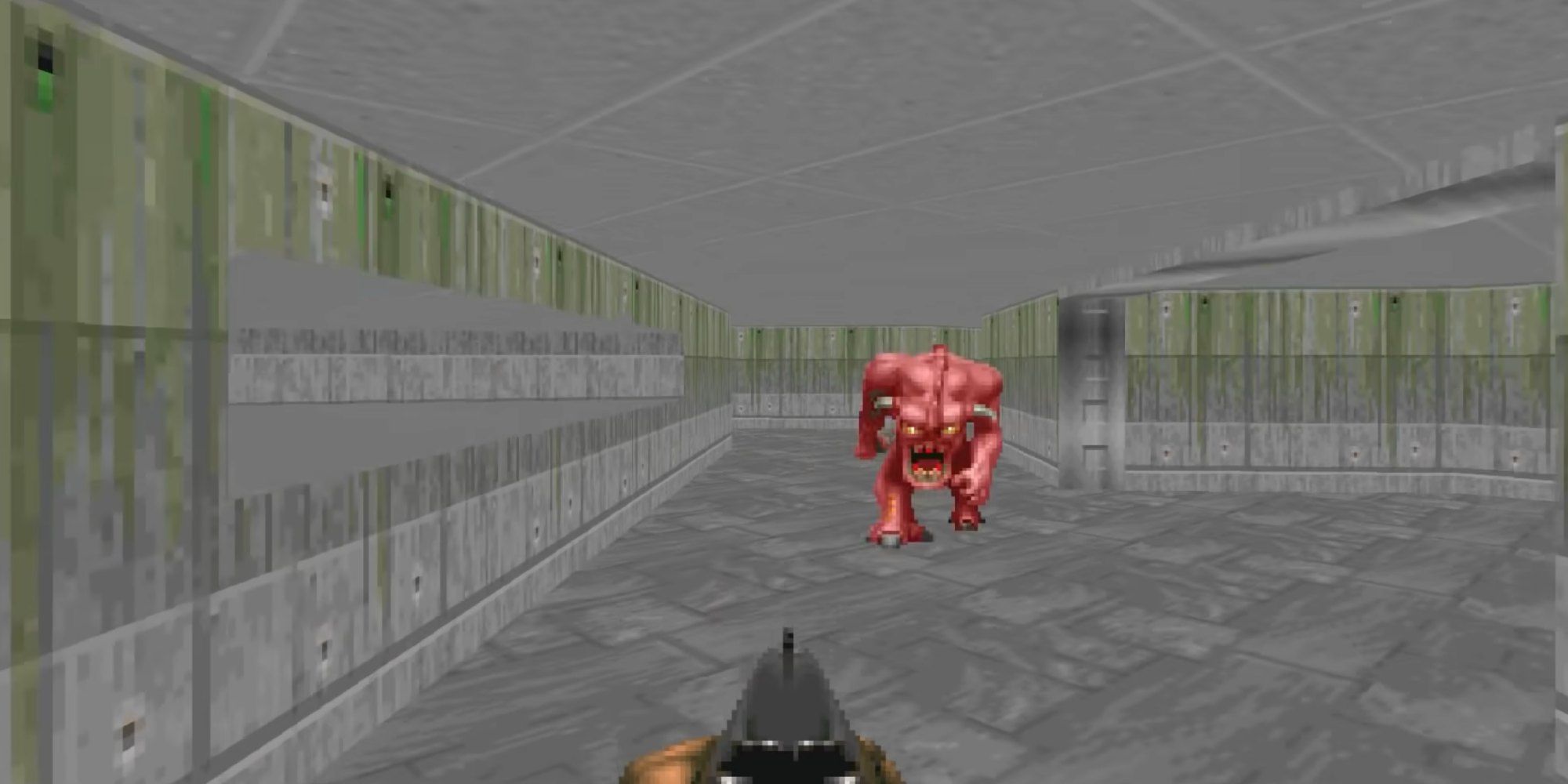 Being chased down a corridor by a monster in 1993's Doom