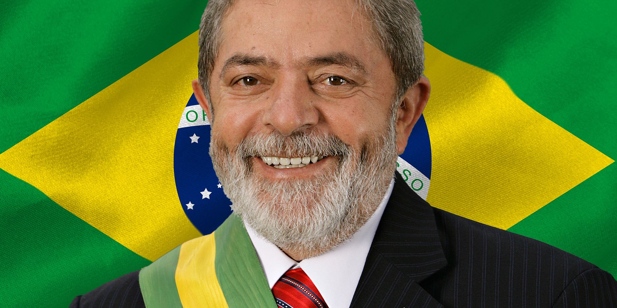 Brazil president Luiz Inácio Lula da Silva in front of the Brazil flag