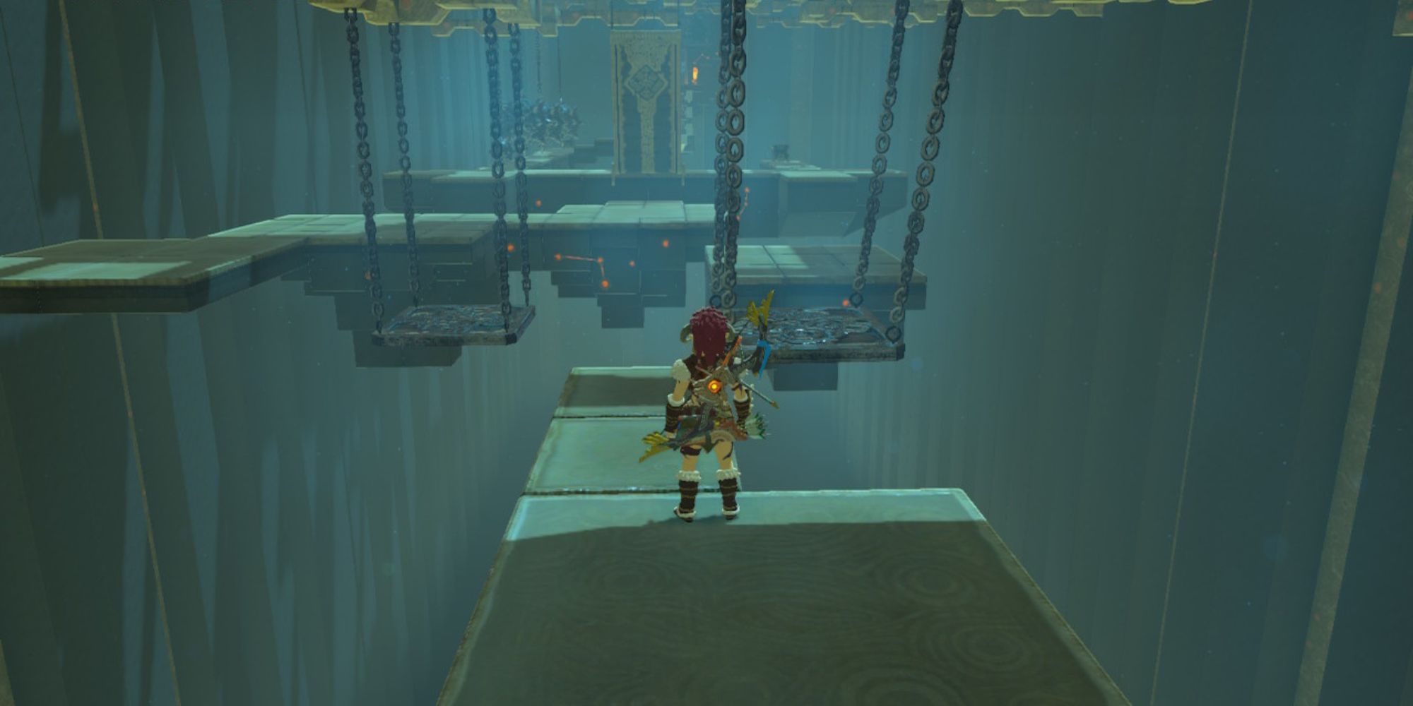 Link stands in front of a swinging platform in the Mogg Latan Shrine