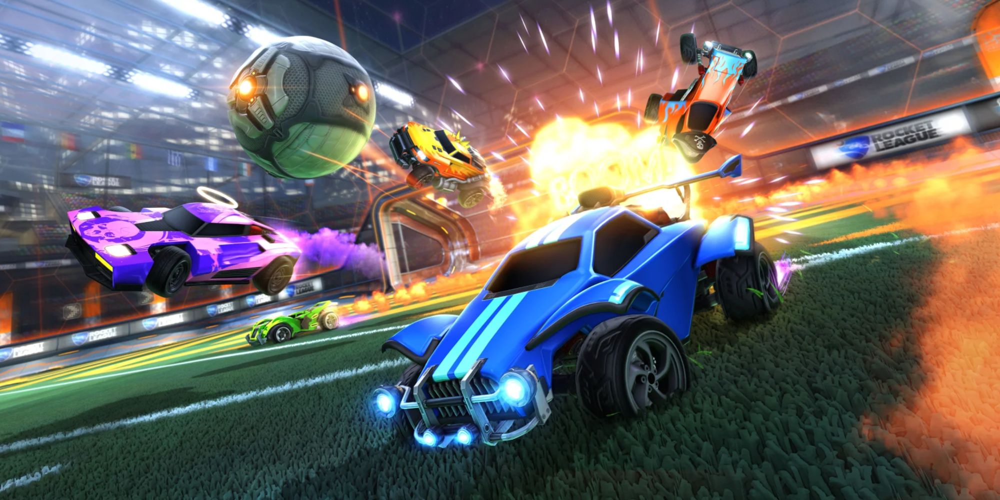 Chaotic game of Rocket League with five cars, the ball and an explosion in Rocket League