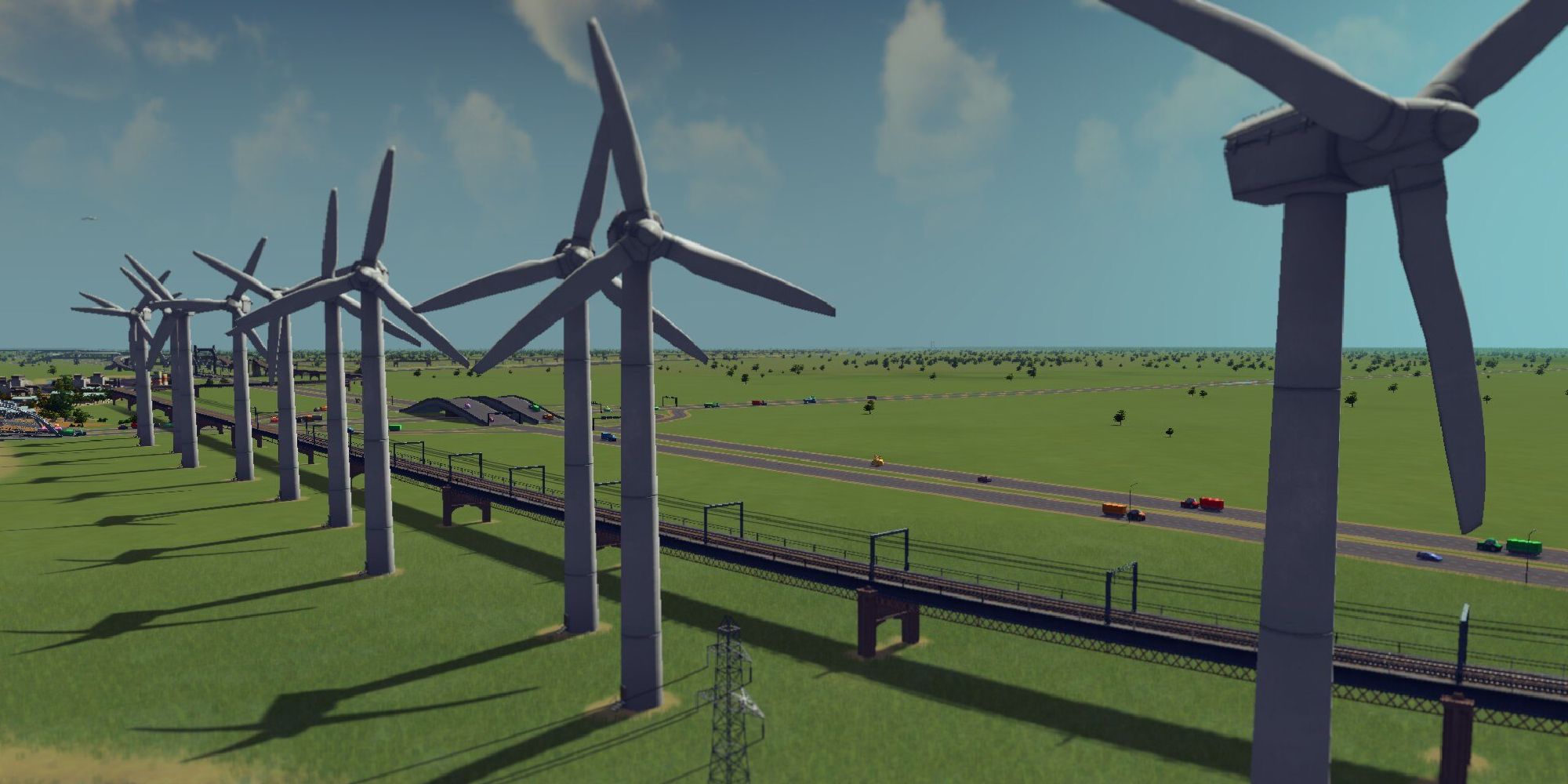 cities skylines wind turbines along highway with train tracks between the two