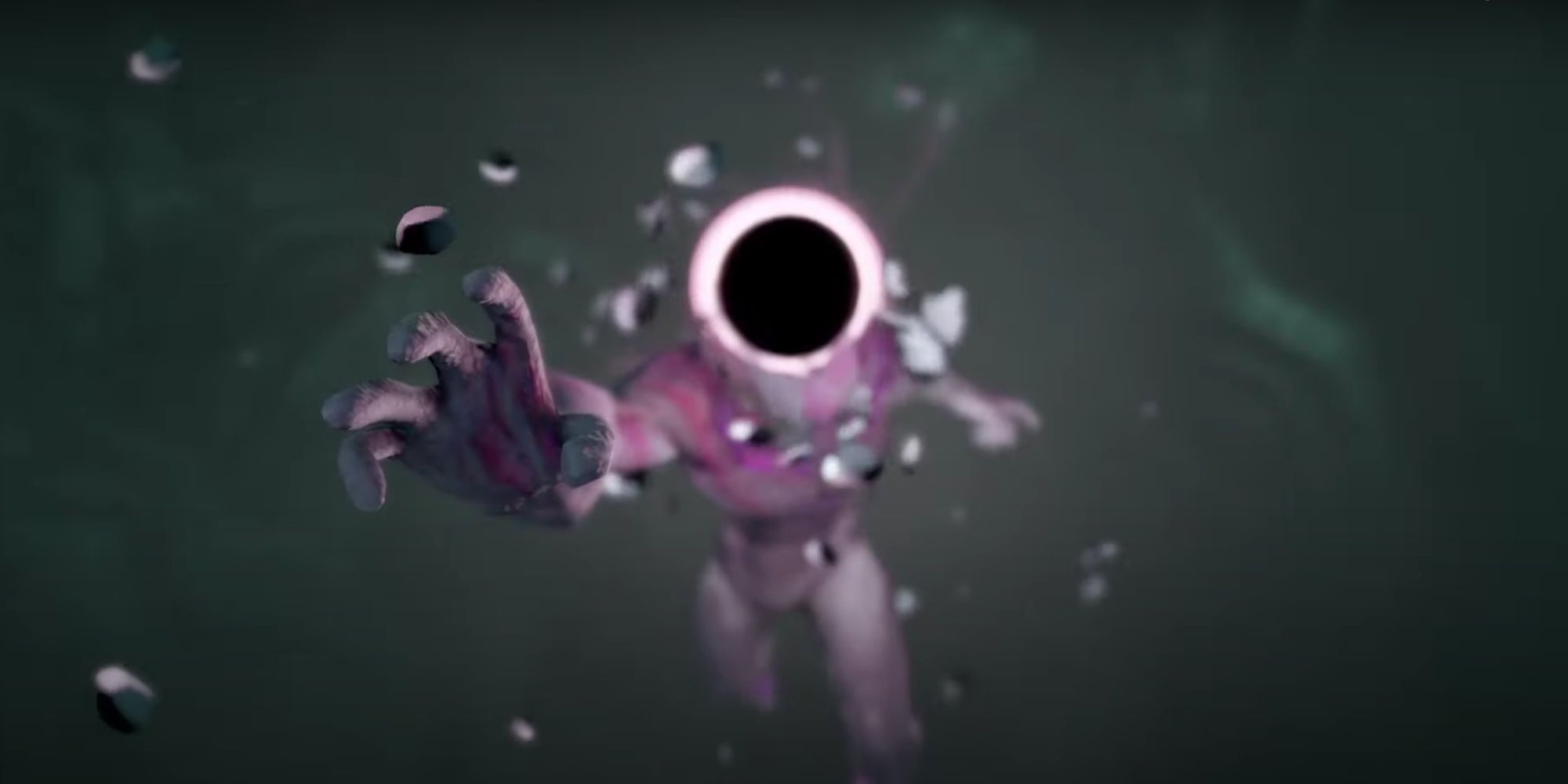 The Vessel from Grime newly formed and reaching a hand out at the screen in the opening cutscene sequence.