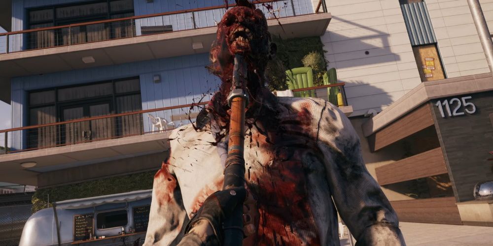 Dead Island 2, Using the Bo Staff to clobber a zombie resized