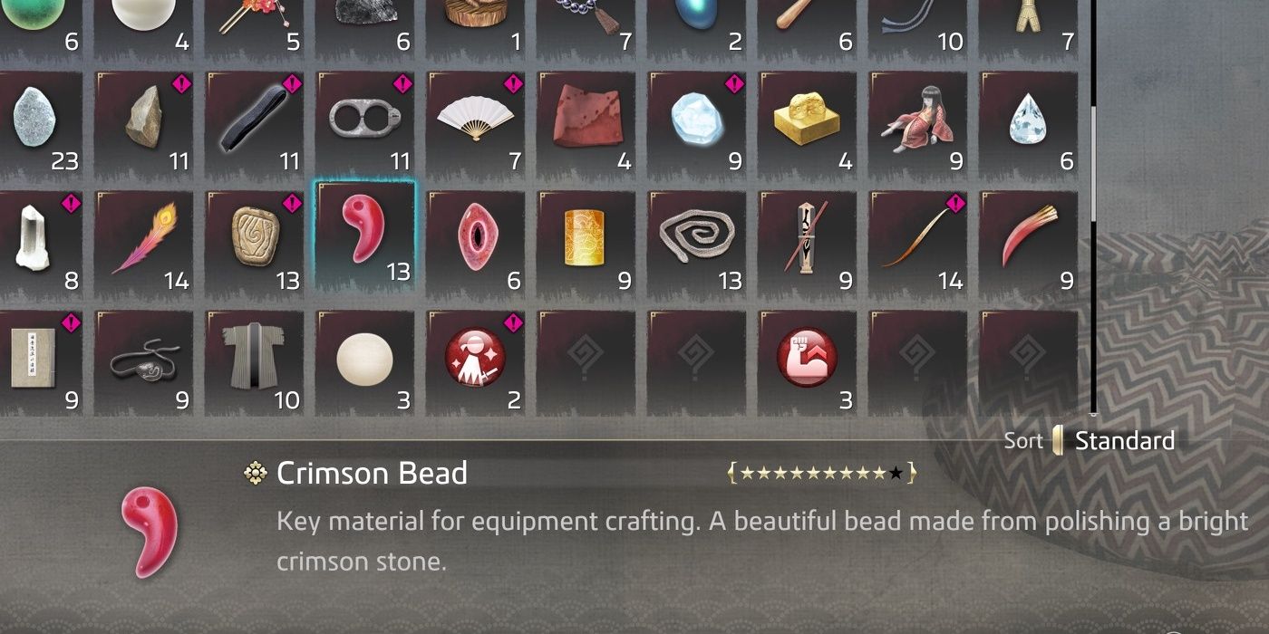 The Crimson Bead and its item description in the inventory menu.