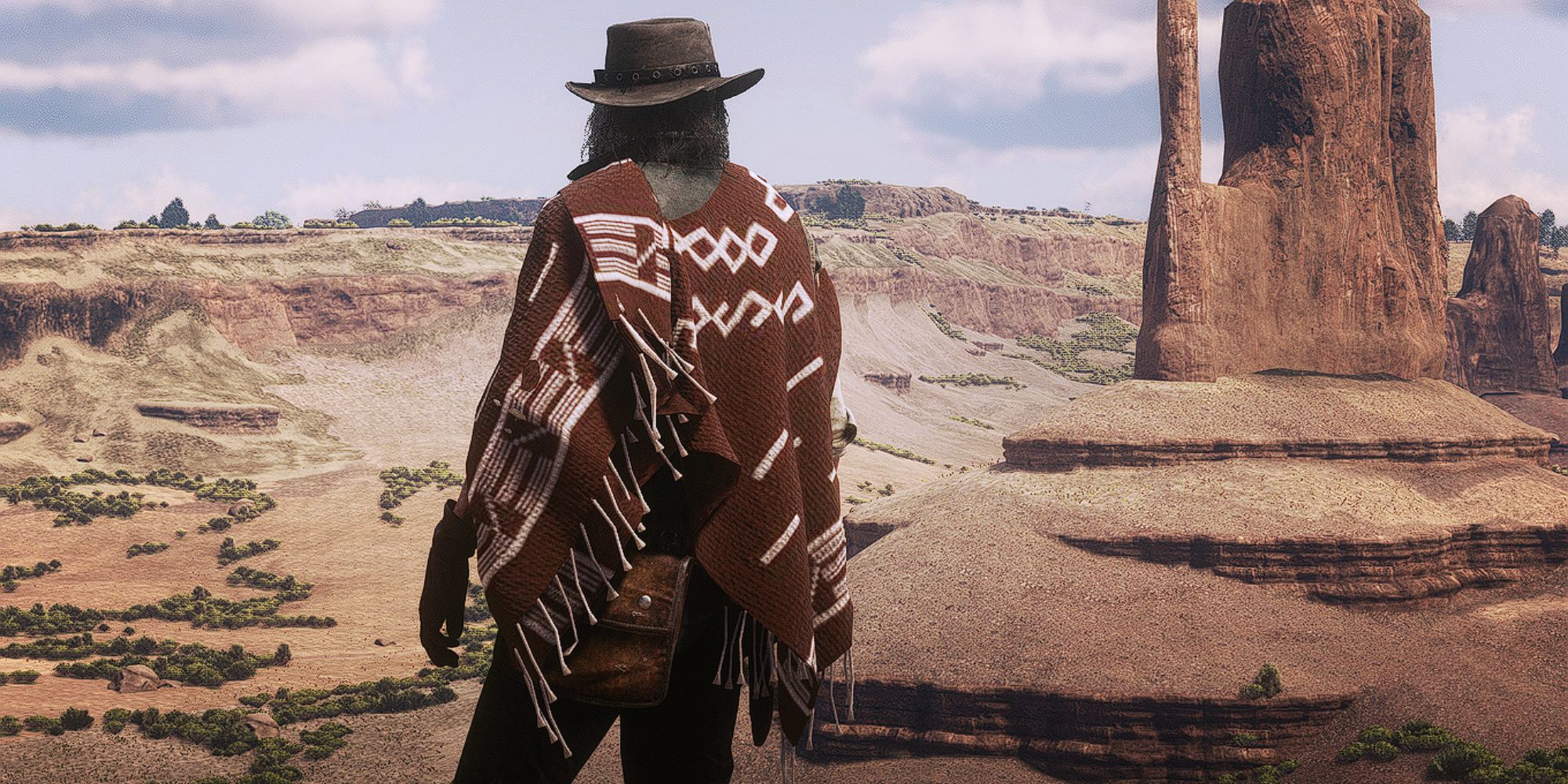 A clothing mod for Red Dead Redemption 2 that adds a brown poncho with white accents.