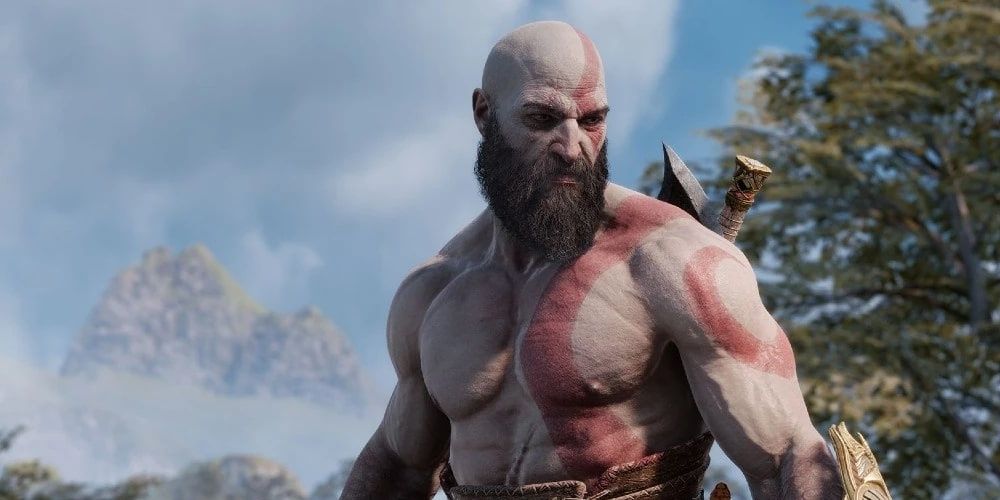 Kratos shirtless, and baring his wrist scars in God of War Ragnarok the video game
