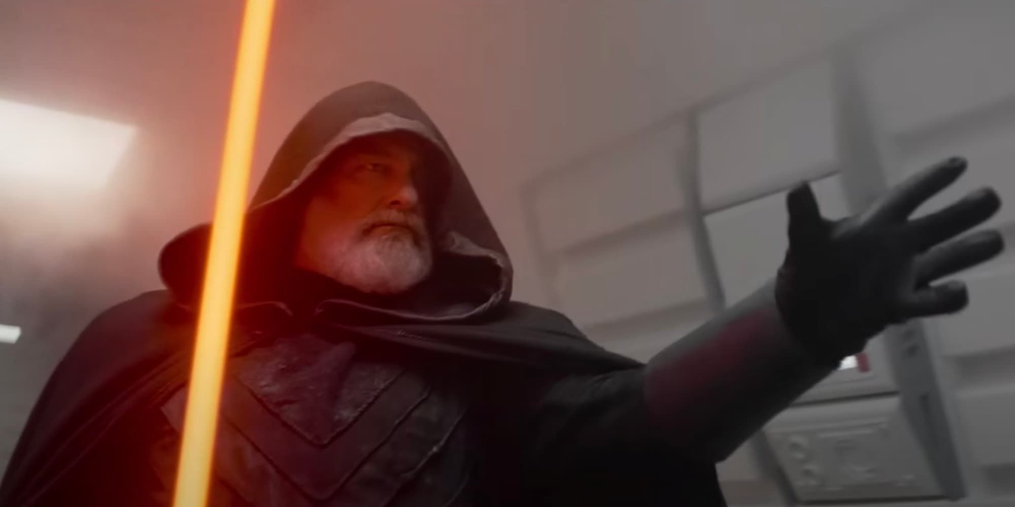 Baylan Skill wields an Orange Lightsaber as he reaches out to use a force choke in the trailer for Ahsoka.