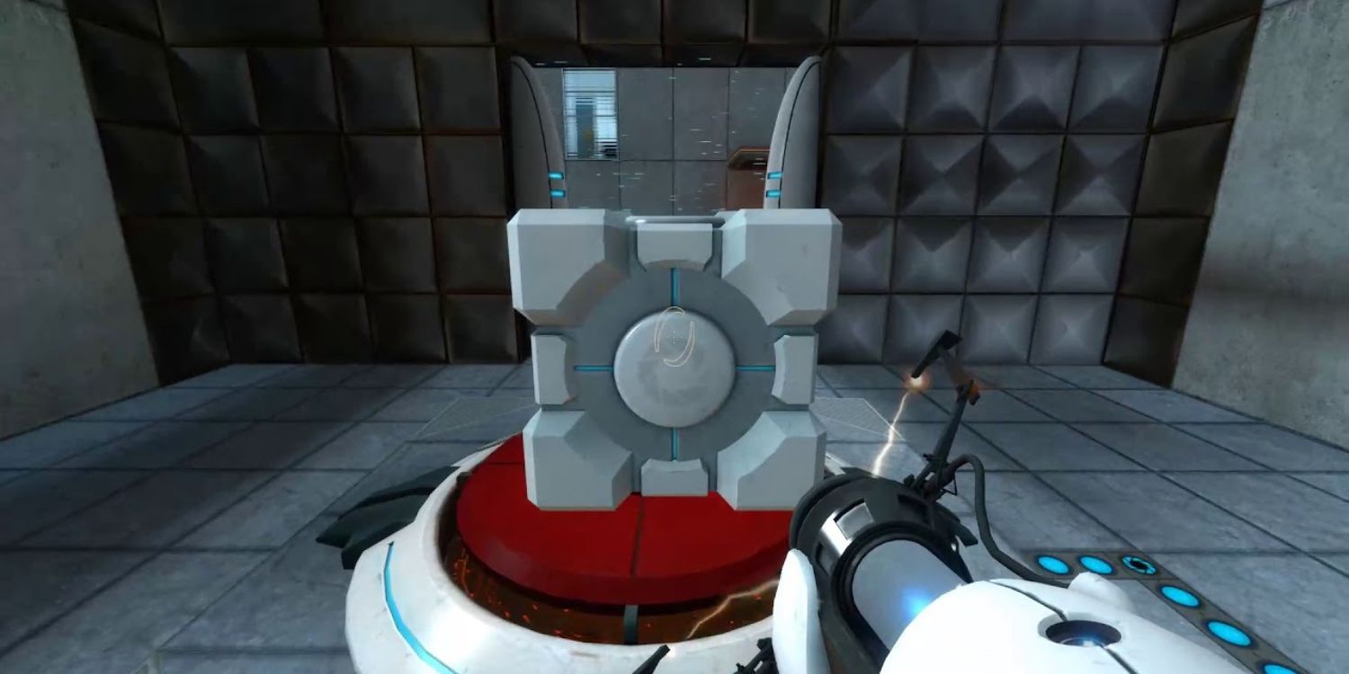 The player looking at a cube on top of a button in Portal.