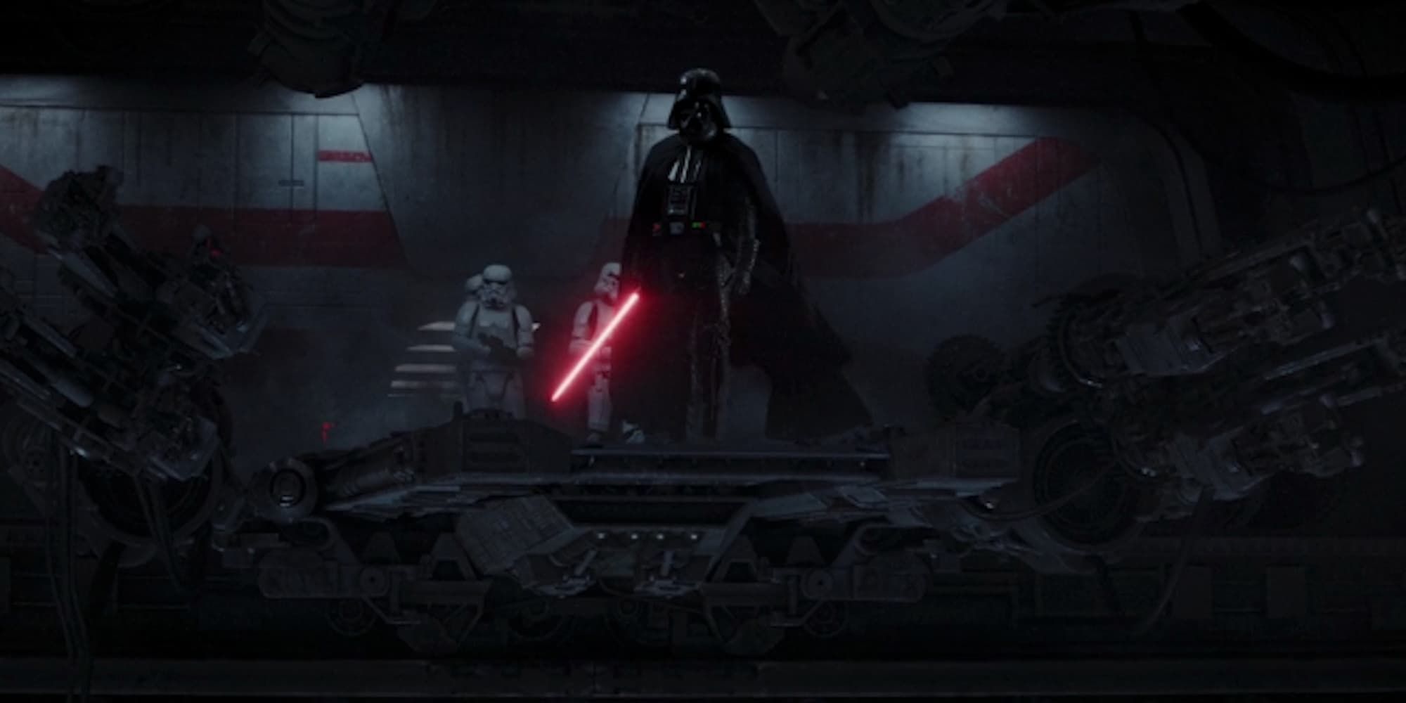 Flanked by Stomrtroopers, Darth Vader wields his Red Lightsaber and looks out from the wreckage of a ship he just attacked.