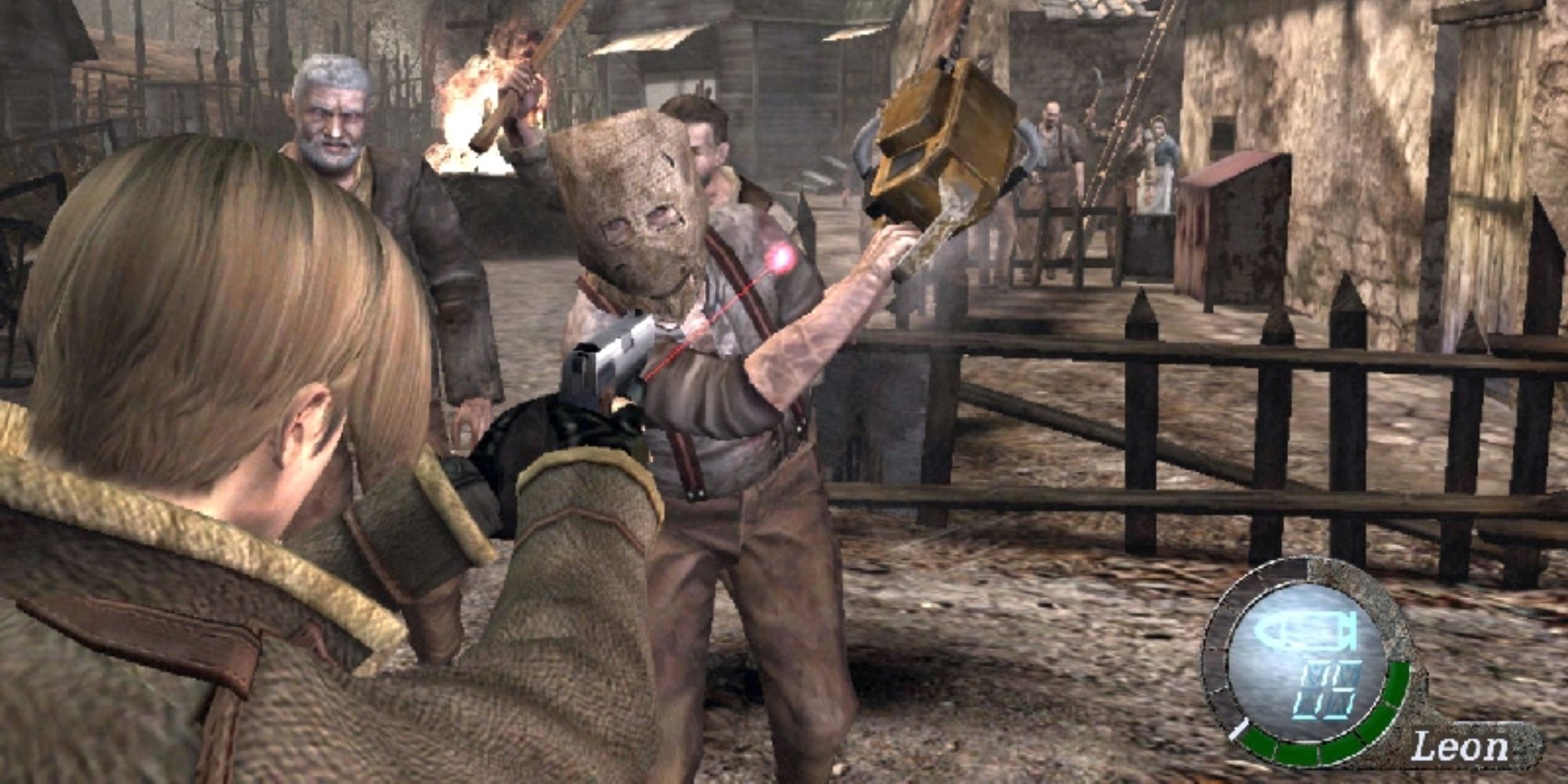 A man with a chainsaw trying to attack Leon in Resident Evil 4.