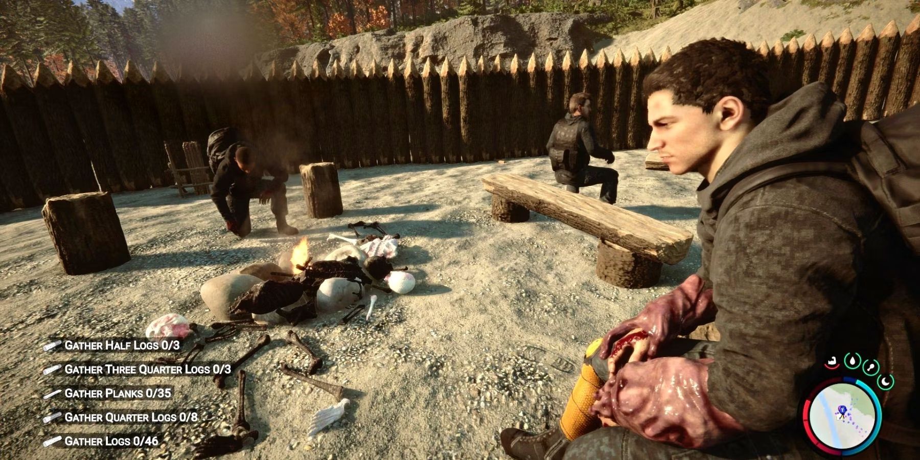Three Sons of the Forest players sit on sand with scattered skeletons burning in a bonfire