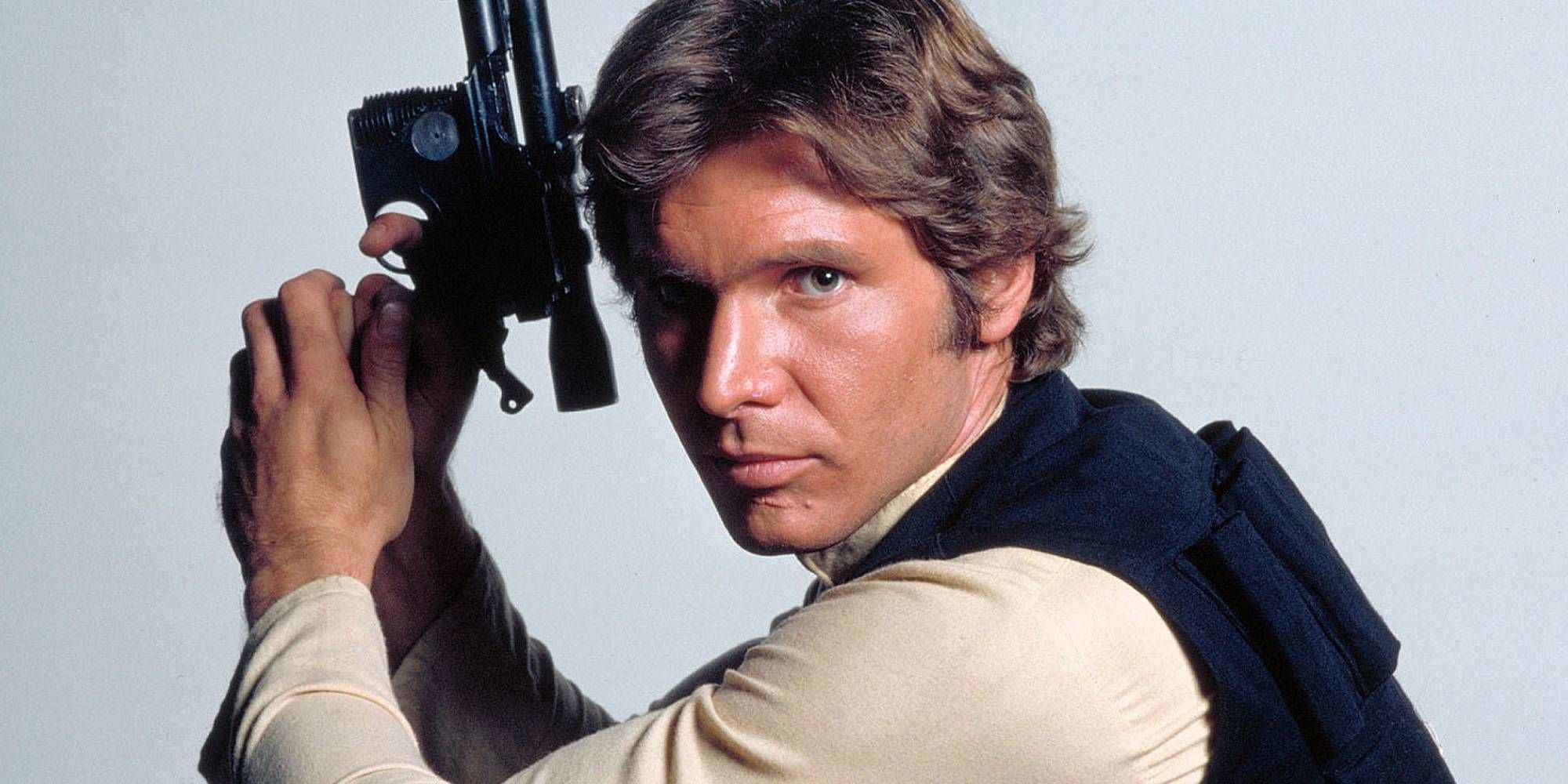 Han Solo poses with his trusty pistol